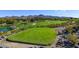 Scenic view of the golf course with water features and mature trees at 11 Feather Sound Dr, Henderson, NV 89052