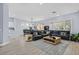 Open living space featuring hardwood floors and abundant natural light at 11 Feather Sound Dr, Henderson, NV 89052