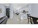 Open-concept living space with modern kitchen and adjoining living area at 11 Feather Sound Dr, Henderson, NV 89052