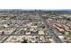 An aerial shot reveals the neighborhood's layout and proximity to the vibrant city skyline at 1424 Balzar Ave, Las Vegas, NV 89106