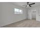 Bedroom features a view to the outdoors and a convenient closet at 1424 Balzar Ave, Las Vegas, NV 89106