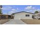 Charming single-story home featuring a well-maintained yard and a classic architectural style at 1424 Balzar Ave, Las Vegas, NV 89106