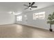 Bright living area with updated floors, lots of natural light, and a ceiling fan at 1424 Balzar Ave, Las Vegas, NV 89106