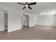 Well-lit living area showcases updated floors, neutral paint, and a ceiling fan at 1424 Balzar Ave, Las Vegas, NV 89106