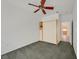 Neutral bedroom with ceiling fan, murphy bed and access to kitchen at 1846 High Mesa Dr, Henderson, NV 89012