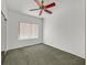 A bright bedroom with a ceiling fan and a window with natural light at 1846 High Mesa Dr, Henderson, NV 89012