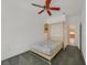Bedroom with carpeted floor, ceiling fan and murphy bed at 1846 High Mesa Dr, Henderson, NV 89012