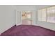Comfortable bedroom with neutral walls, a ceiling fan, and large windows at 1846 High Mesa Dr, Henderson, NV 89012