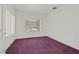 Cozy bedroom with plush carpeting, a large window, and ample natural light at 1846 High Mesa Dr, Henderson, NV 89012