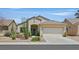 Charming single-story home with a well-manicured yard and desert landscaping at 1846 High Mesa Dr, Henderson, NV 89012