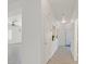 A clean and bright hallway with white walls and tile floors at 1846 High Mesa Dr, Henderson, NV 89012