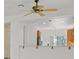Kitchen view with ceiling fan and white breakfast bar at 1846 High Mesa Dr, Henderson, NV 89012