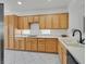 View of the Kitchen with wooden cabinets, countertops, and appliances at 1846 High Mesa Dr, Henderson, NV 89012
