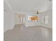 Spacious living area featuring tile floors, ample lighting and a view to the kitchen at 1846 High Mesa Dr, Henderson, NV 89012