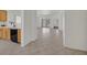 Open-concept living area with tile floors and sliding door access to the backyard at 1846 High Mesa Dr, Henderson, NV 89012