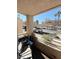 Cozy balcony area overlooking the parking area and other community buildings at 2171 Bay Club Dr # 103, Laughlin, NV 89029