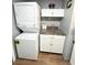 Efficient laundry room with stacked washer and dryer, plus storage at 2171 Bay Club Dr # 103, Laughlin, NV 89029