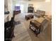 Comfortable living room with a fireplace and plush reclining sofas at 2171 Bay Club Dr # 103, Laughlin, NV 89029