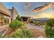Backyard landscape with desert plants, stone accents, and a gazebo at 2180 Skyline Heights Ln, Henderson, NV 89052
