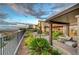 Desert landscaped backyard featuring an outdoor seating area and scenic views at 2180 Skyline Heights Ln, Henderson, NV 89052