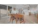 Charming dining room with stylish furnishings, scenic views, and hardwood floors, creating a perfect ambiance for meals at 2180 Skyline Heights Ln, Henderson, NV 89052