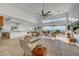 Open-concept living room with modern furniture, sleek design, and expansive outdoor view at 2180 Skyline Heights Ln, Henderson, NV 89052