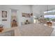 Expansive living room with lots of natural light and modern finishes, great for hosting and relaxation at 2180 Skyline Heights Ln, Henderson, NV 89052