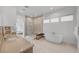 Modern main bathroom with a glass shower, soaking tub, and dual vanities at 2180 Skyline Heights Ln, Henderson, NV 89052