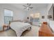 Bright main bedroom featuring carpeted floors and large windows with mountain views at 2180 Skyline Heights Ln, Henderson, NV 89052