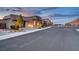 A modern luxury home neighborhood with wide streets, beautiful landscaping, and mountain views at 2180 Skyline Heights Ln, Henderson, NV 89052