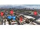 An aerial view showcases the community pool and its proximity to area shopping and restaurants at 2504 Paradise Village Way, Las Vegas, NV 89120