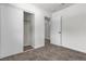 Bedroom featuring a closet with sliding doors and neutral carpet at 2504 Paradise Village Way, Las Vegas, NV 89120