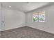 Bedroom with neutral carpet, a window with a view, and recessed lighting at 2504 Paradise Village Way, Las Vegas, NV 89120