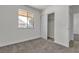 Bedroom featuring a window and closet space with sliding doors at 2504 Paradise Village Way, Las Vegas, NV 89120