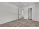 A bright bedroom featuring neutral carpet and closet with sliding doors at 2504 Paradise Village Way, Las Vegas, NV 89120