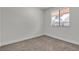 Neutral bedroom with a window providing natural light at 2504 Paradise Village Way, Las Vegas, NV 89120