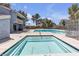Community pool and spa with seating and lush landscaping at 2504 Paradise Village Way, Las Vegas, NV 89120