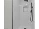 Shower with modern, black fixtures and a built in shelf for storage of toiletries at 2504 Paradise Village Way, Las Vegas, NV 89120