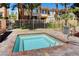Private hot tub surrounded by brick pavers and fencing, providing a secluded relaxation space at 251 S Green Valley Pkwy # 721, Henderson, NV 89012