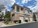 Charming two-story condo boasts a private balcony and attached one-car garage at 251 S Green Valley Pkwy # 721, Henderson, NV 89012