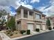 Charming two-story condo boasts a private balcony and attached one-car garage at 251 S Green Valley Pkwy # 721, Henderson, NV 89012