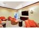 Cozy living room space featuring comfortable seating arrangement and a mounted television at 251 S Green Valley Pkwy # 721, Henderson, NV 89012