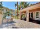 Outdoor patio showcasing a built-in grill and dining area, perfect for entertaining at 251 S Green Valley Pkwy # 721, Henderson, NV 89012
