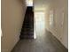 Inviting entryway with tile flooring and a staircase leading to the upper level at 2947 Caxton Grove Dr, Henderson, NV 89052