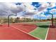 Outdoor basketball court with green and red painted surface and multiple hoops at 3088 Bicentennial Pkwy, Henderson, NV 89044