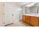 Bathroom features a glass-enclosed shower and vanity with storage at 3088 Bicentennial Pkwy, Henderson, NV 89044