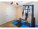 Home gym and closet space featuring rubber flooring and natural light from the window at 3088 Bicentennial Pkwy, Henderson, NV 89044