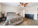 Bright bedroom featuring a ceiling fan and ample space for a queen-sized bed at 3088 Bicentennial Pkwy, Henderson, NV 89044