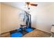 Bedroom converted to a gym with rubber flooring, a ceiling fan, and natural light at 3088 Bicentennial Pkwy, Henderson, NV 89044