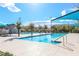 Outdoor swimming pool with lounge area and shade structures at 3088 Bicentennial Pkwy, Henderson, NV 89044